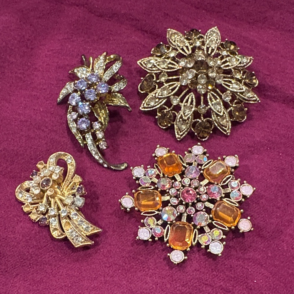 Source Unknown Gold and Purple Brooch Collection